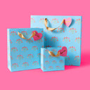 Blue gift bags with bouquets